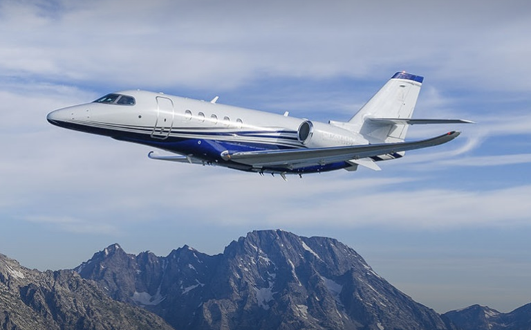 Cessna Citation Latitude over mountains