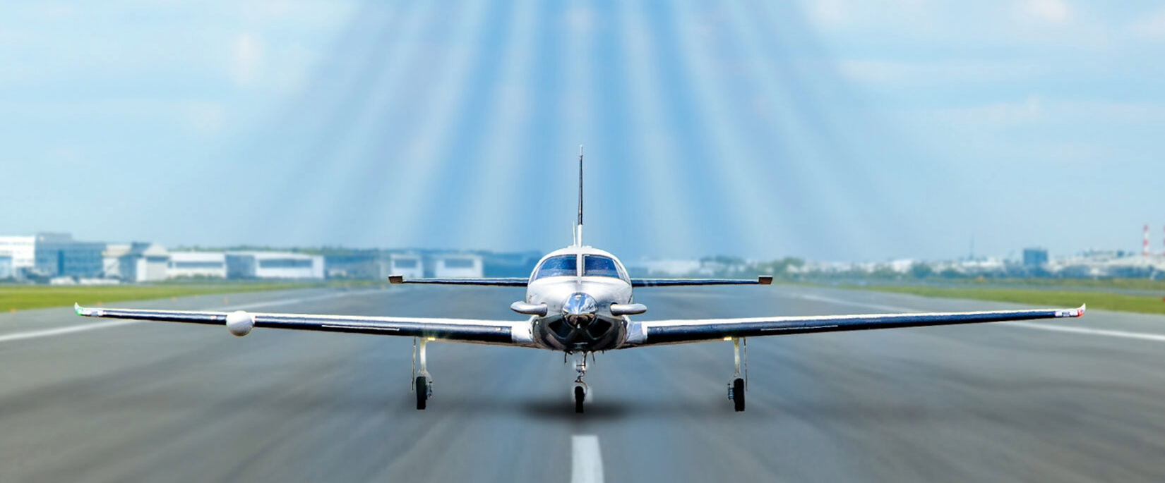 M700 aircraft straight on view of the nose on while it is on the runway