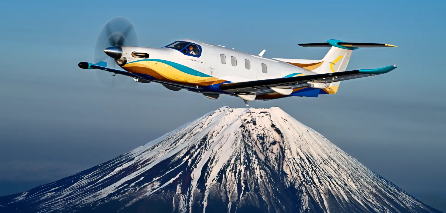 PC12 flying over a volcano