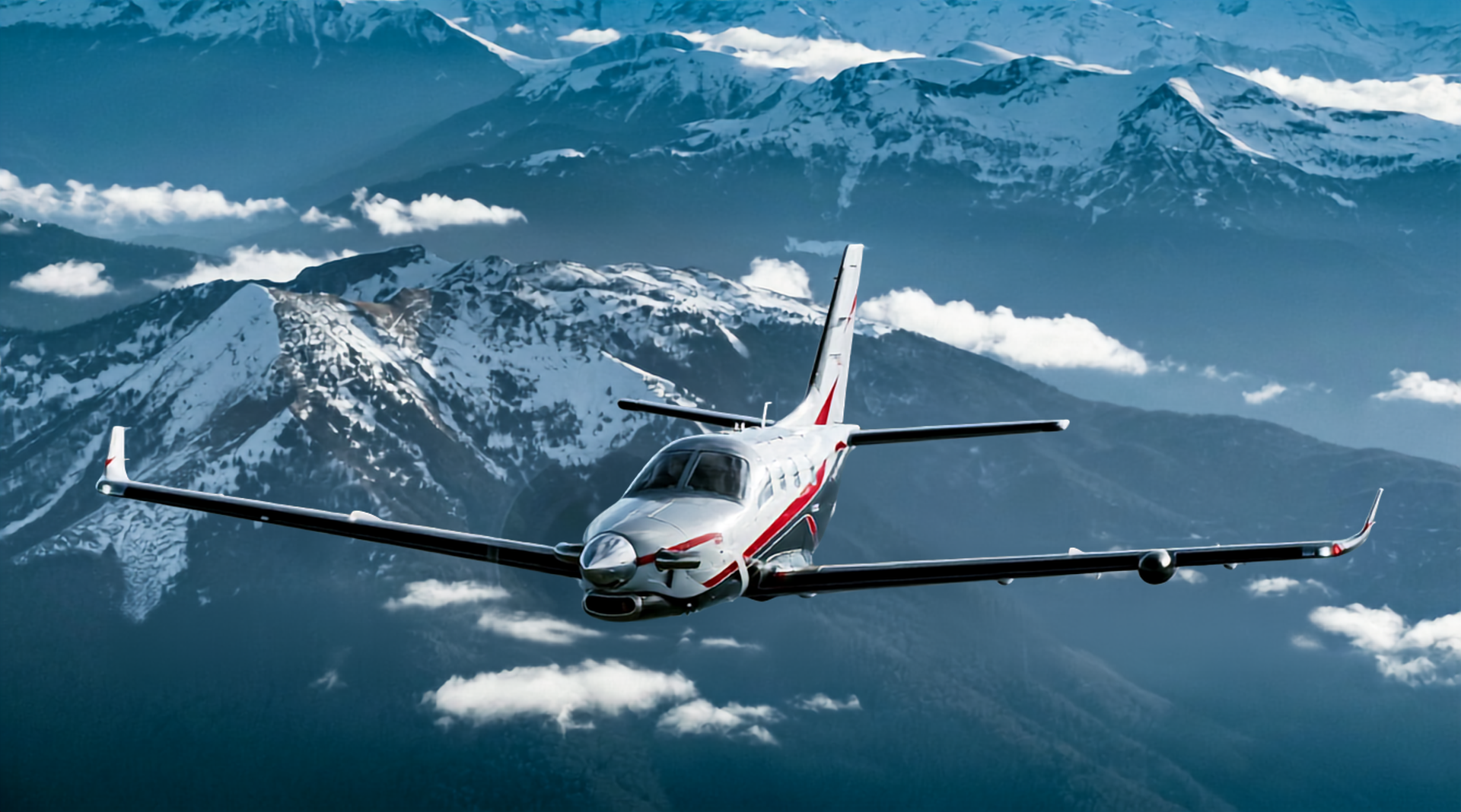 Socata / Daher TBM 960 in flight over mountains