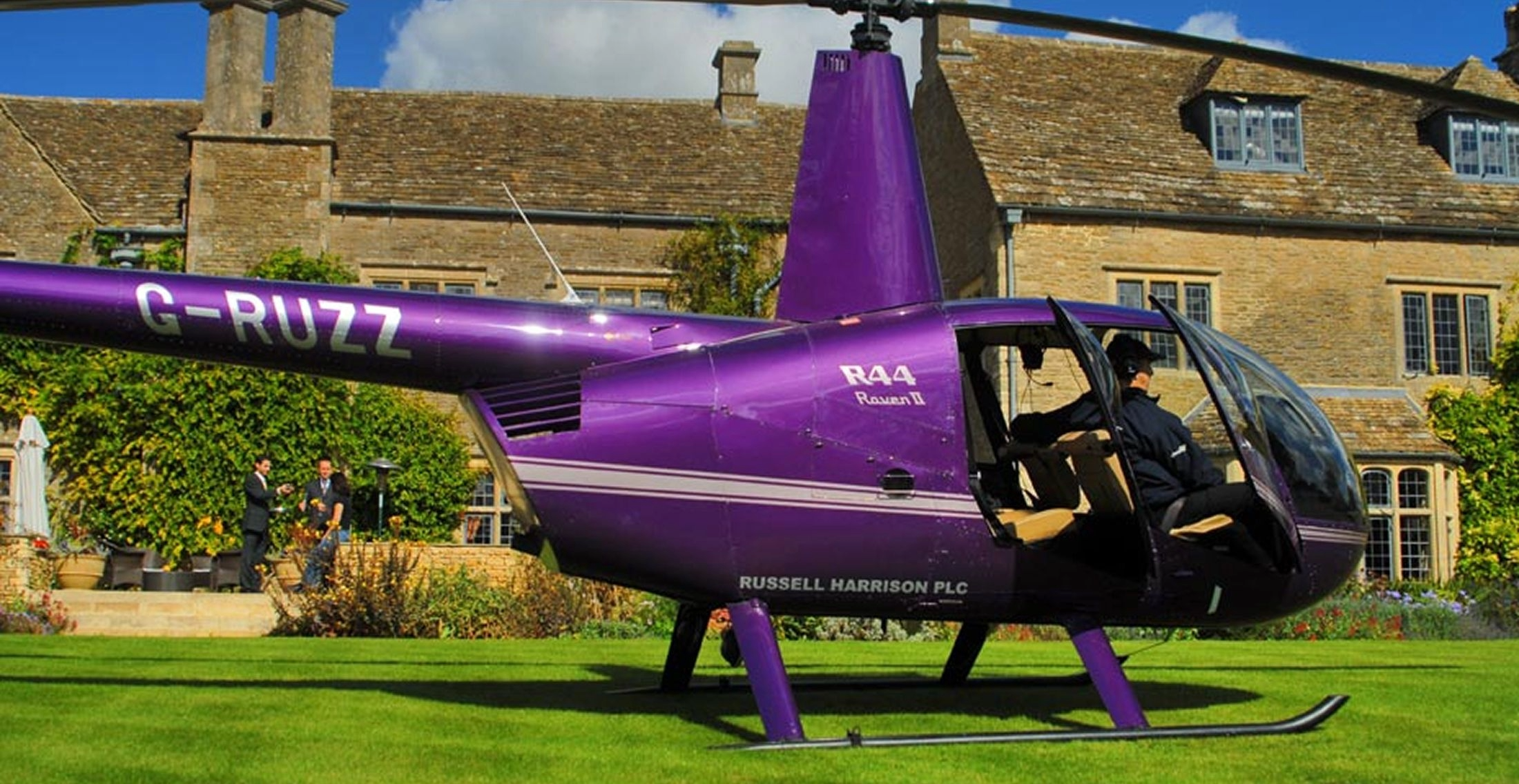 Robinson R44 helicopter on a lawn