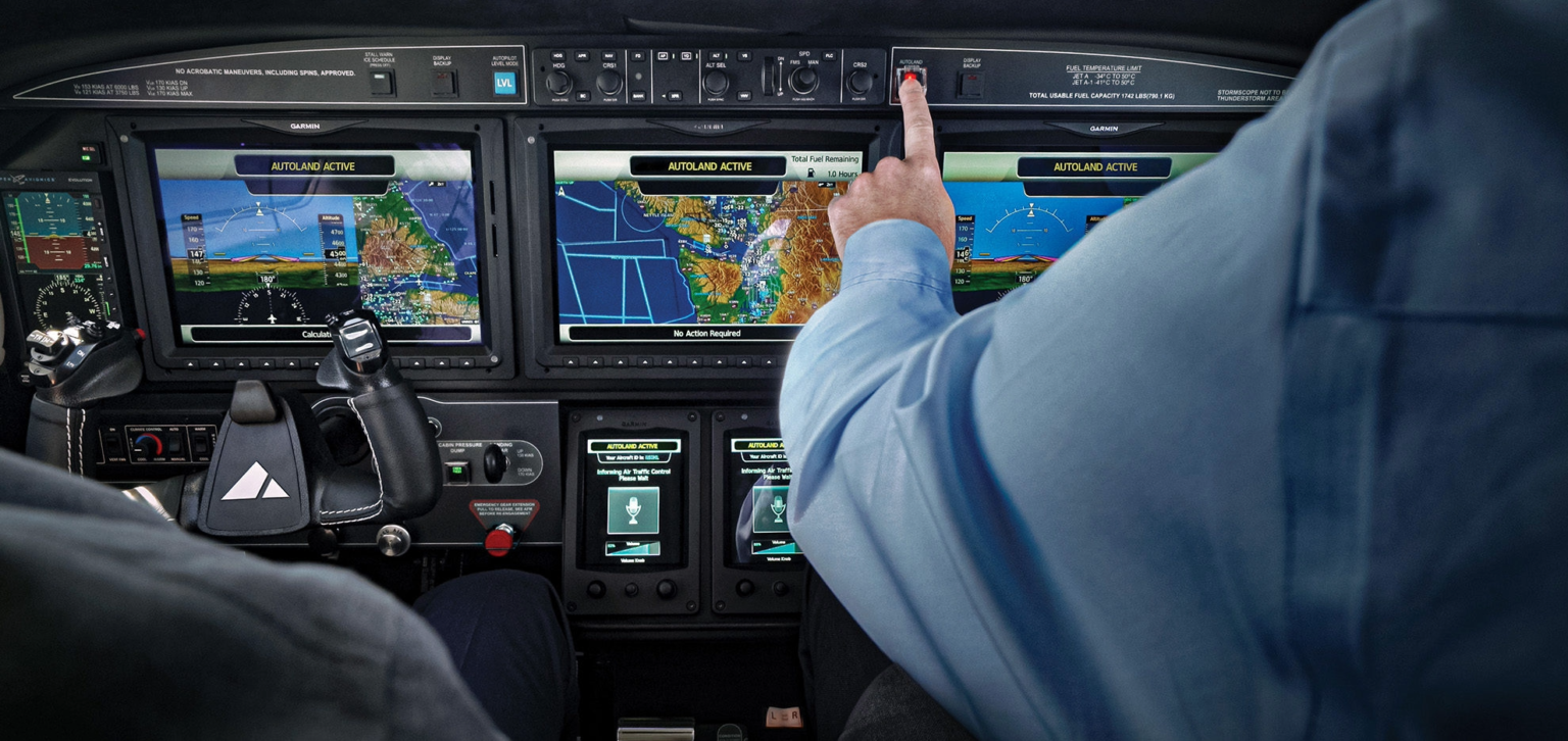 Pilot seated in a Piper M600 cockpit